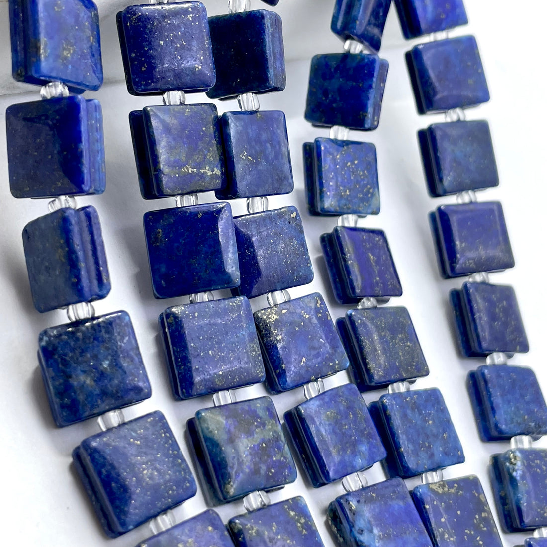 Flat square lapis, blue howlite, black agate, bronzite, carnelian and bloodstone