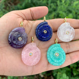 Natural stone ammonite charm