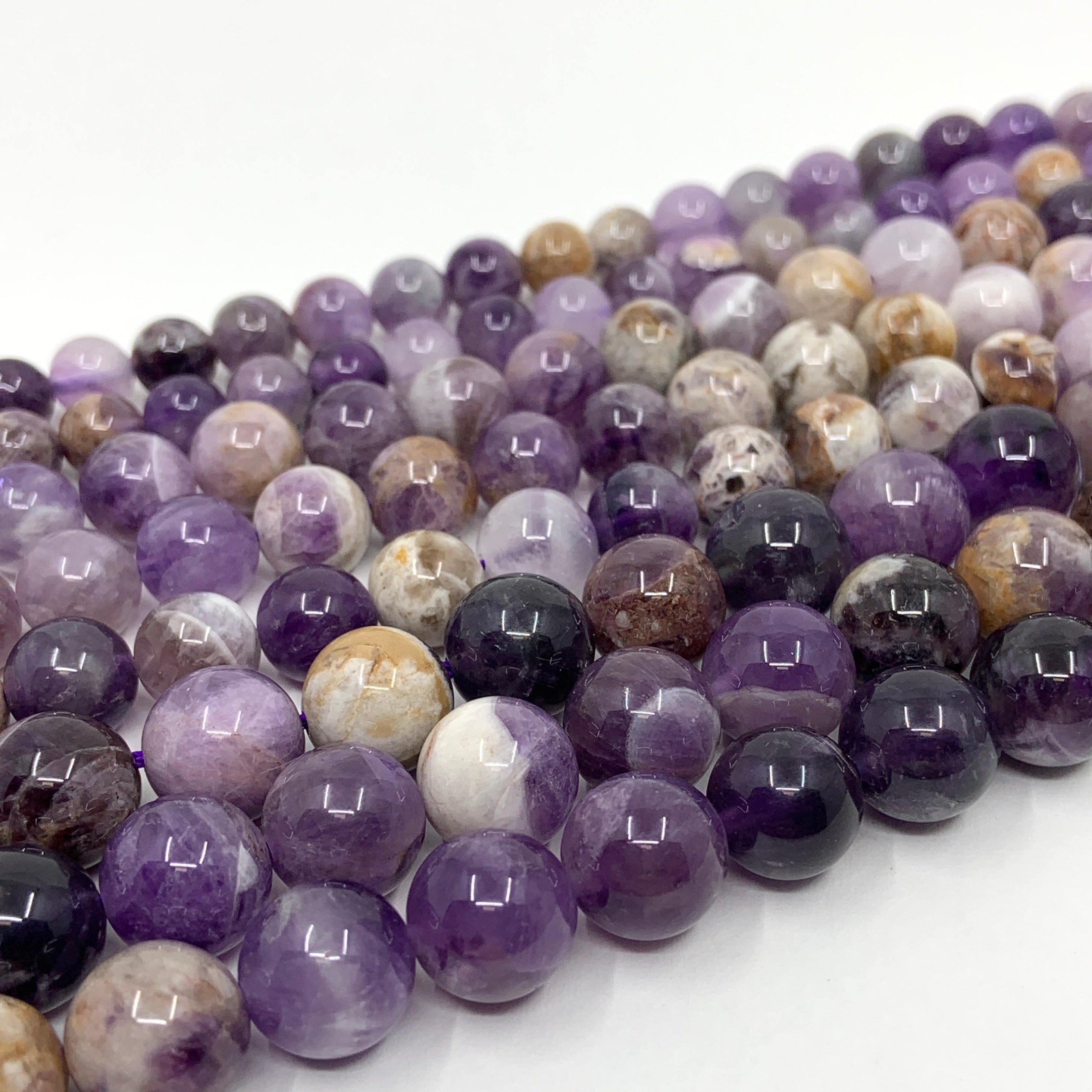 Dog Tooth Amethyst Beads