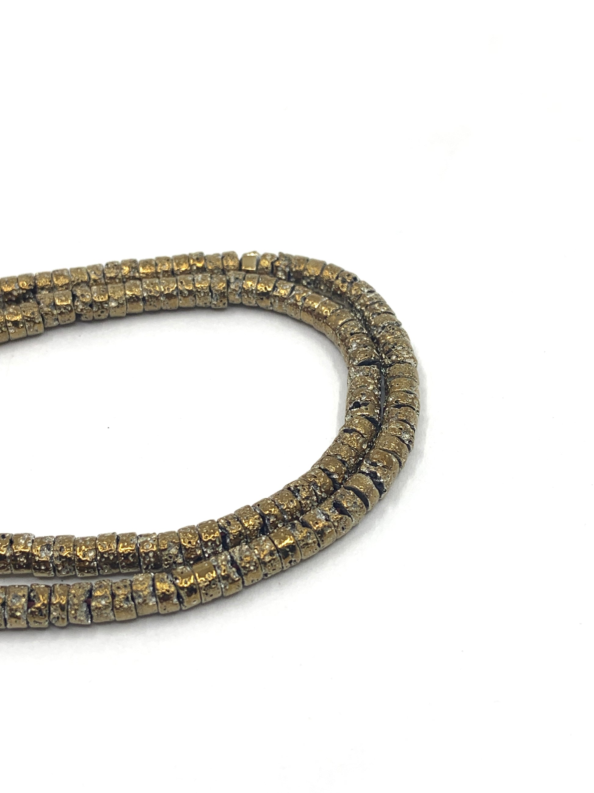 Lava Flat Round Spacer Beads in gold color