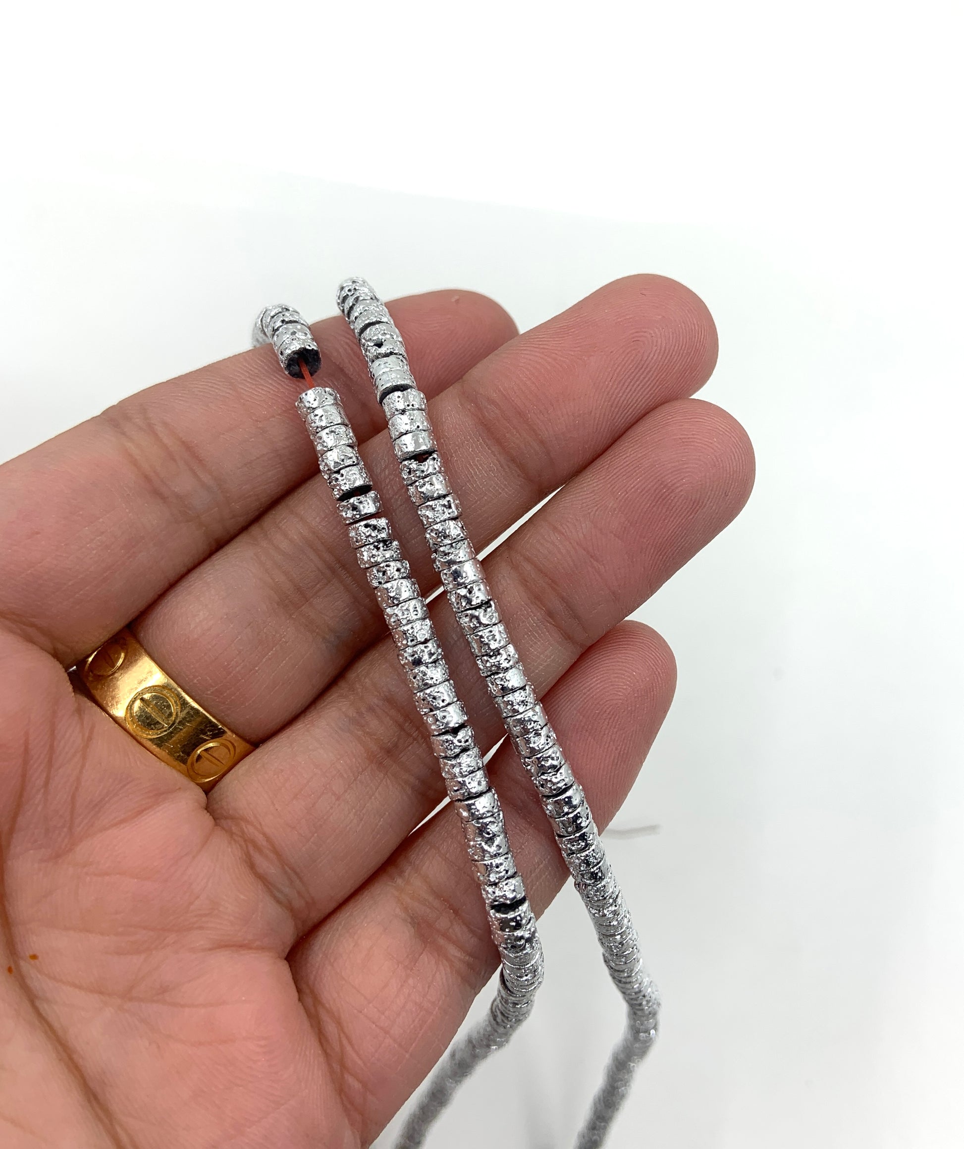 Lava Flat Round Spacer Beads in silver color