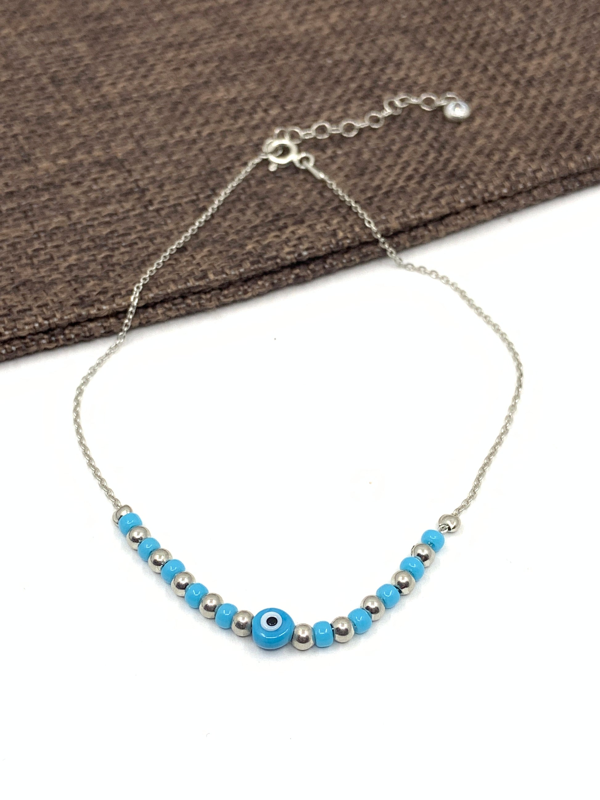 Light blue evil eye anklet 