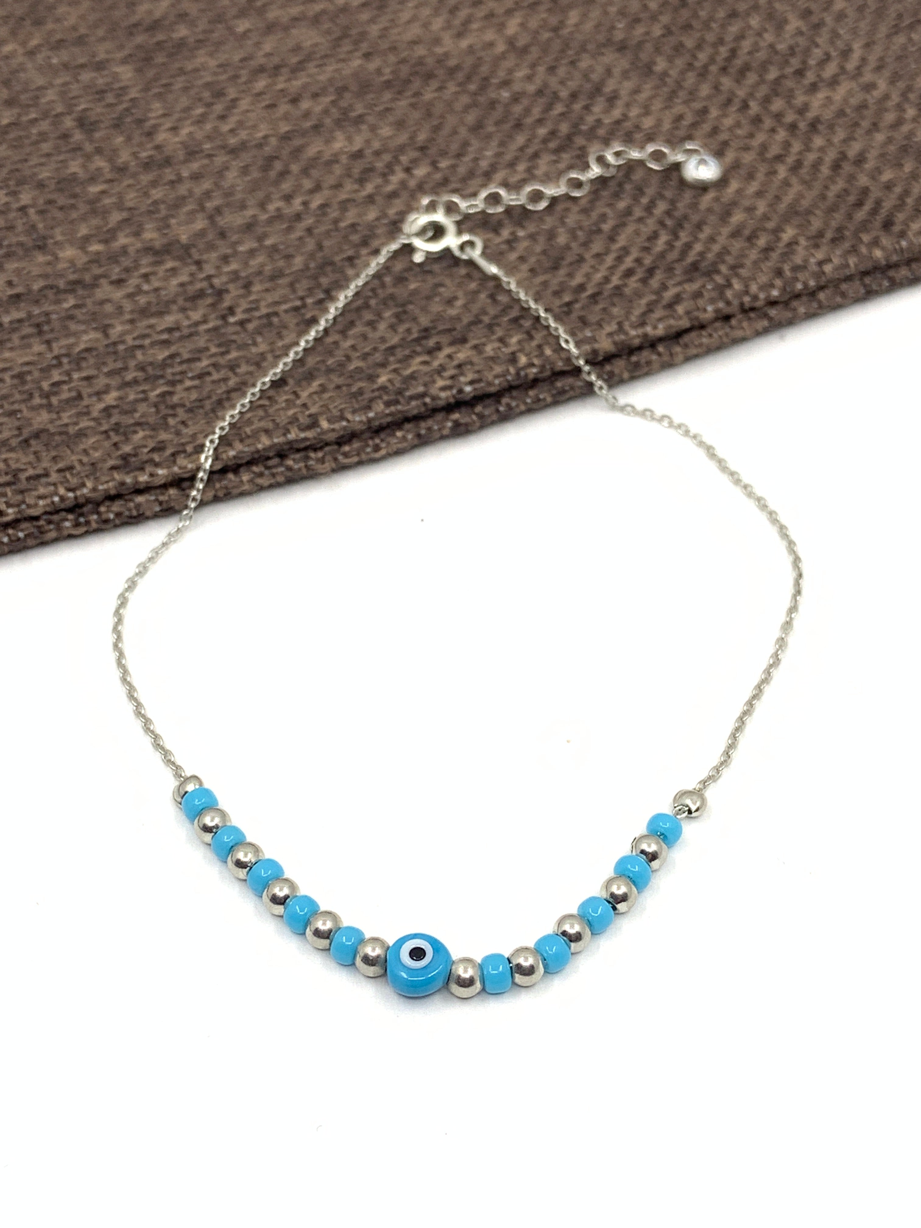 Light blue evil eye anklet 