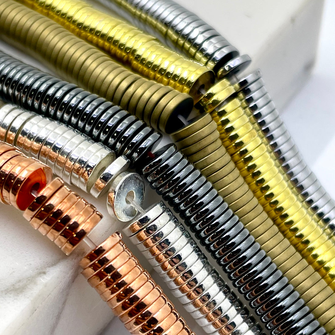 6mm x 1mm flat hematite disc beads