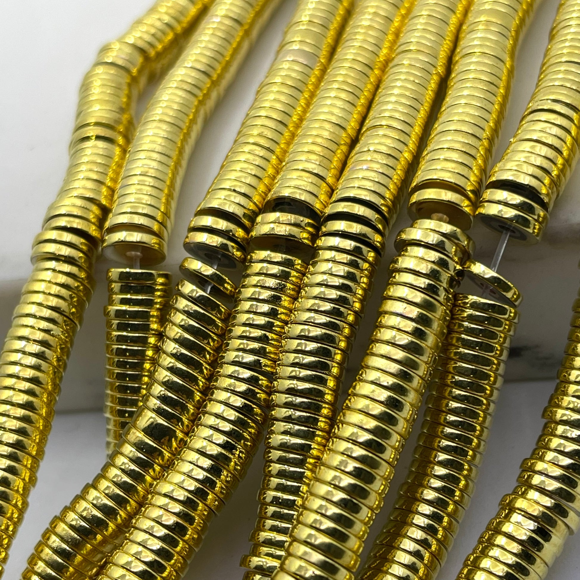 Gold hematite flat disc