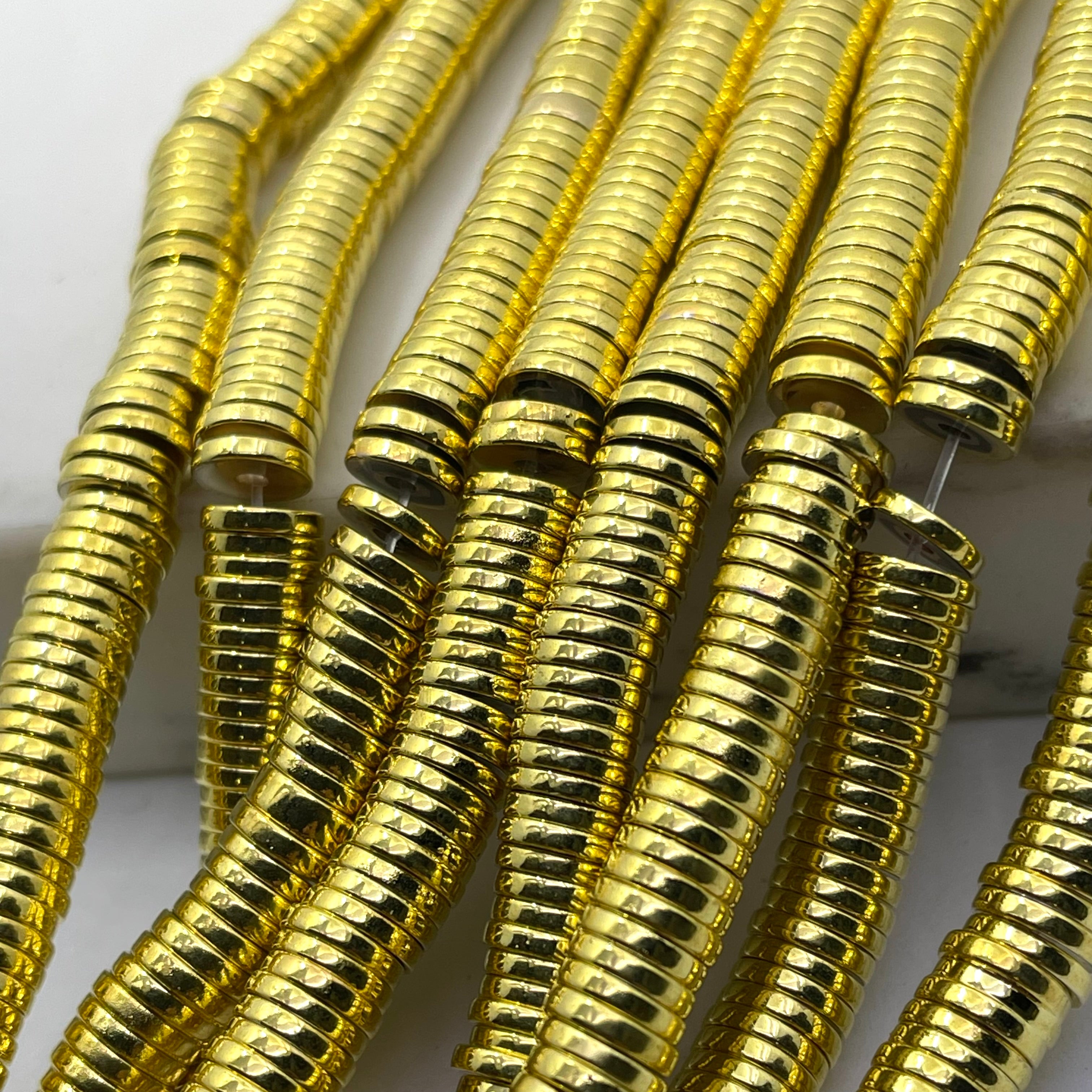 Gold hematite flat disc