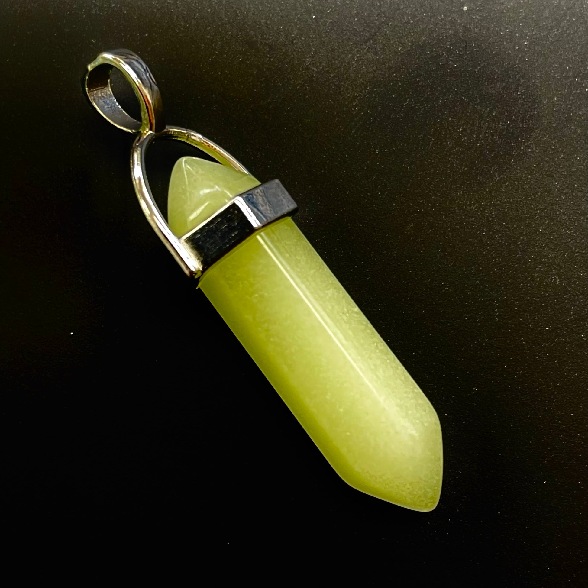 Glow in the dark bullet pendant