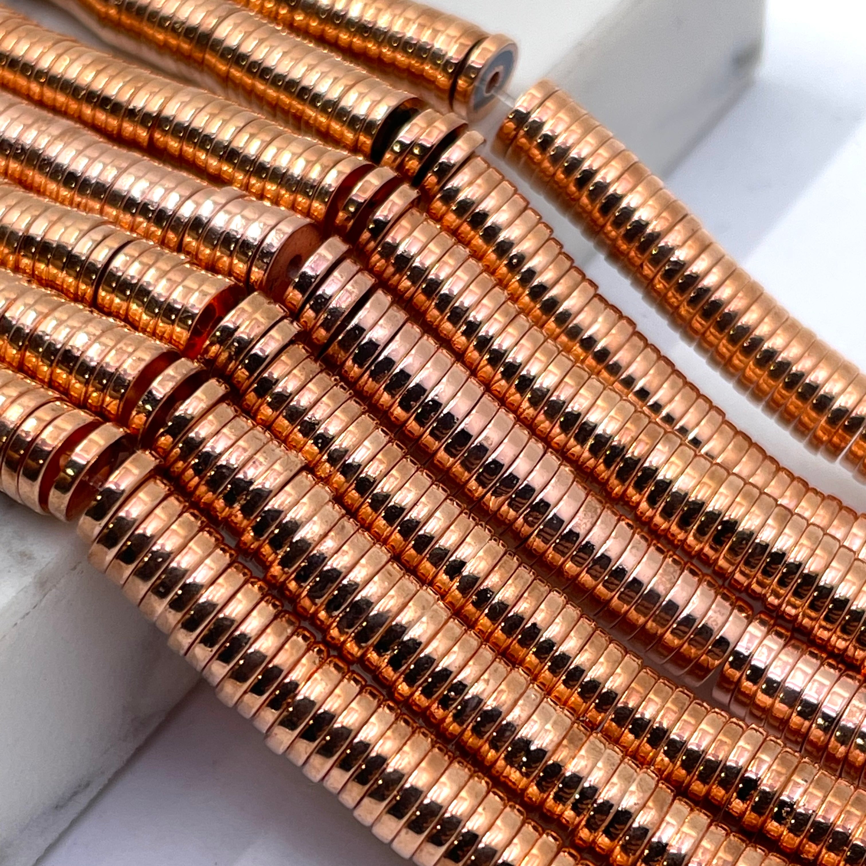 Rose gold hematite flat disc