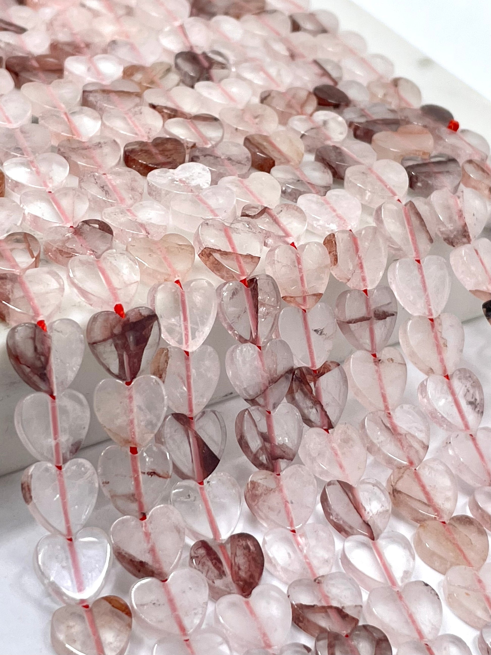 Fire Quartz heart beads in close up