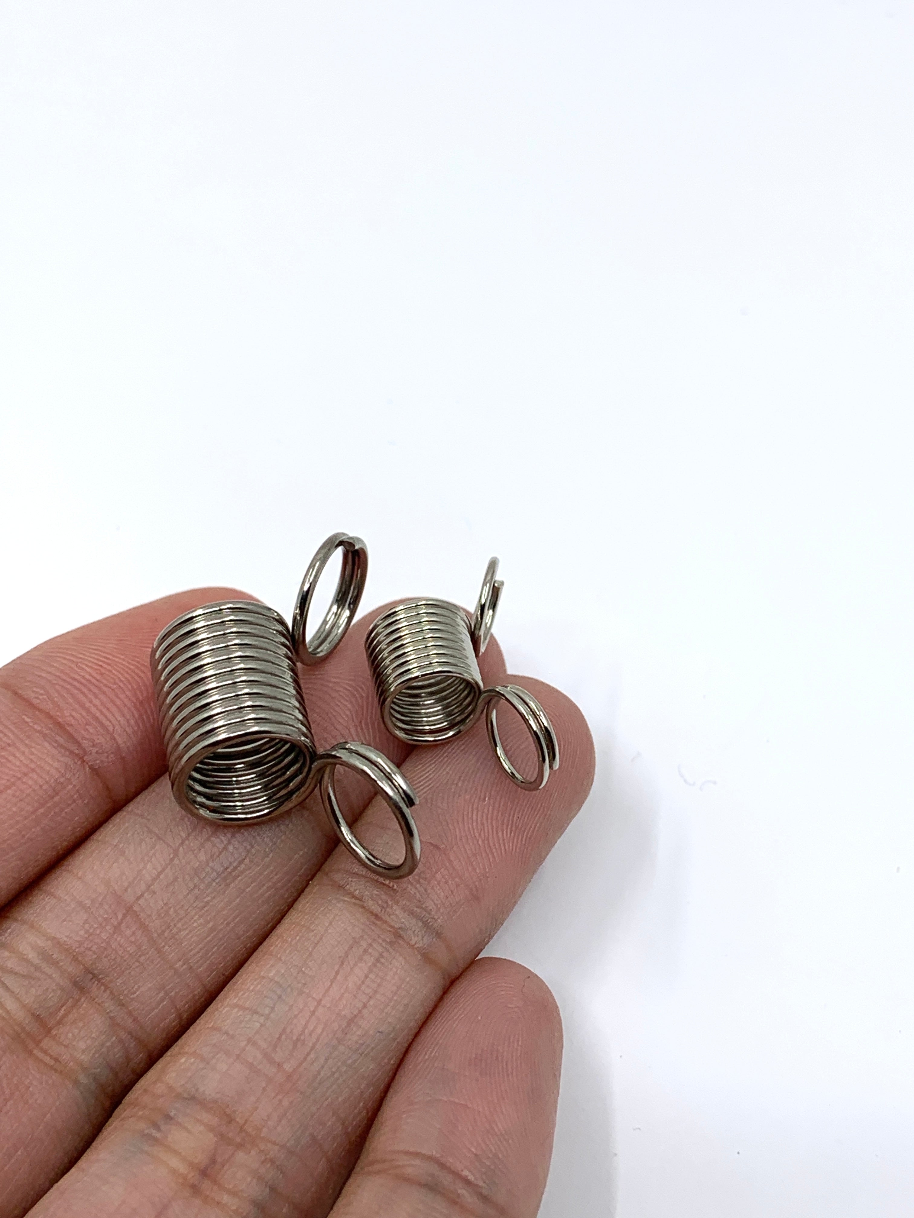 Bead Stopper Springs on hand for size reference