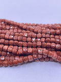 4mm cube faceted goldstone