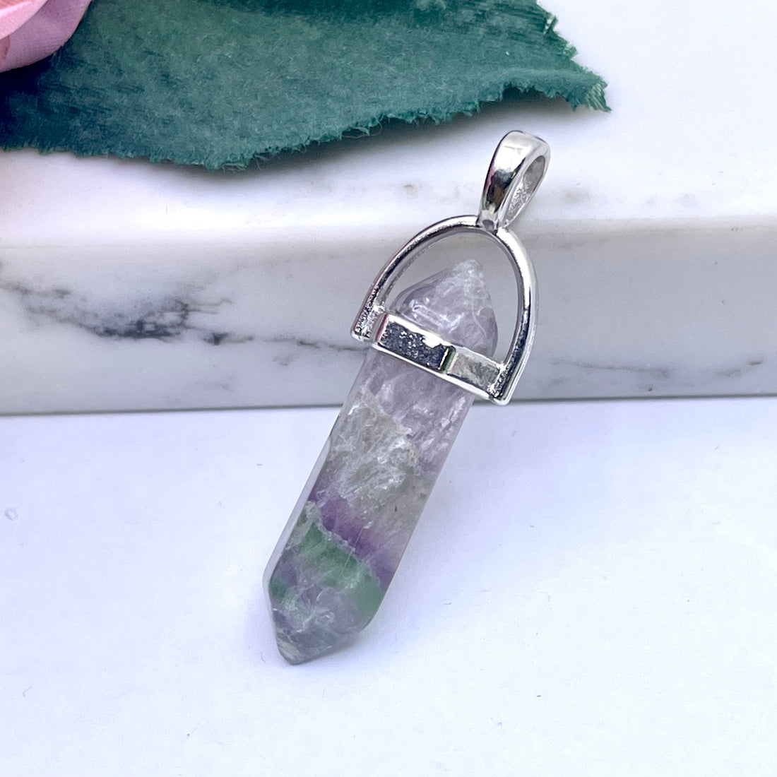 Blue howlite, pink agate, lemon jade, flourite, larvikite, white jade, opalite and glow in the dark hexagonal pendants
