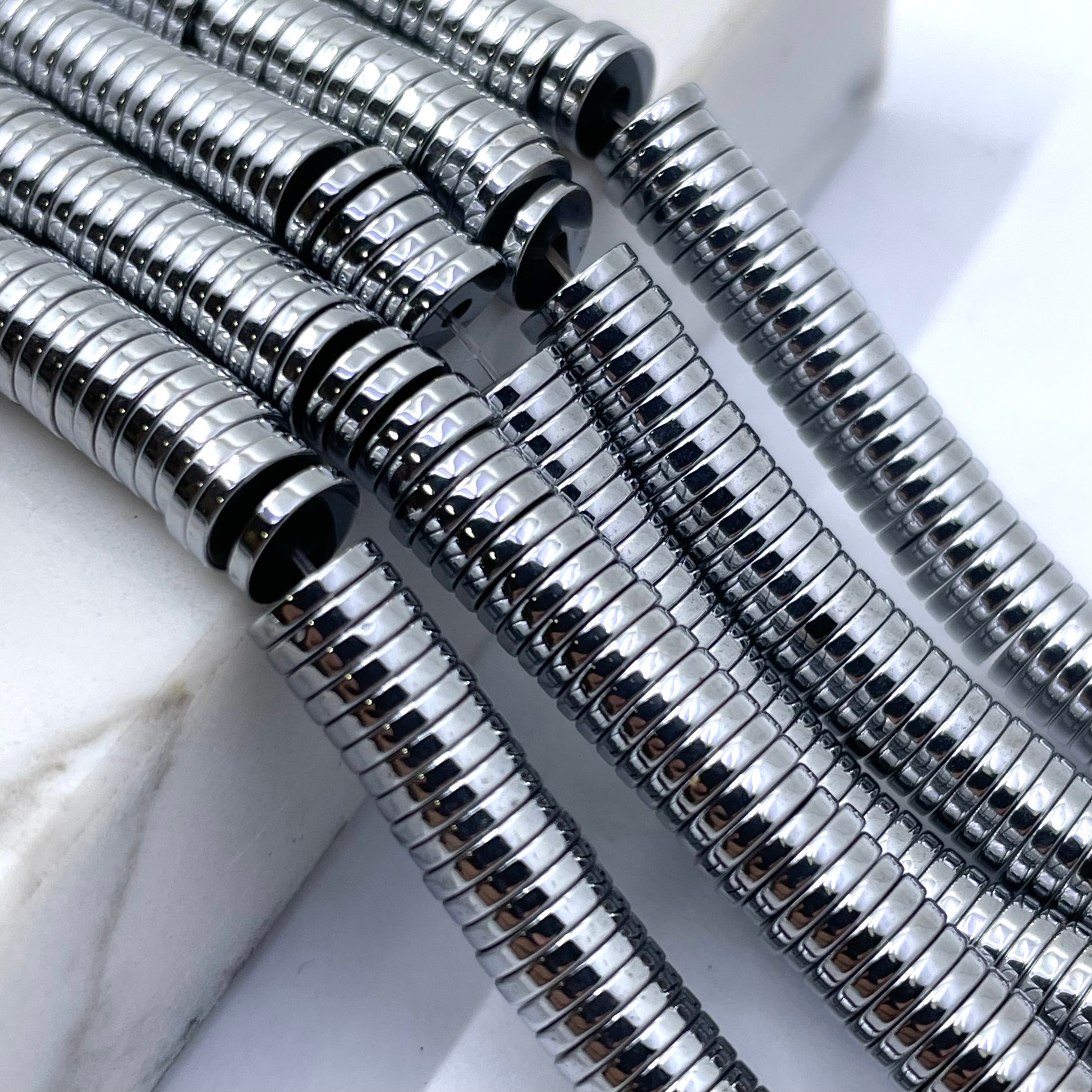 Rhodium hematite flat disc