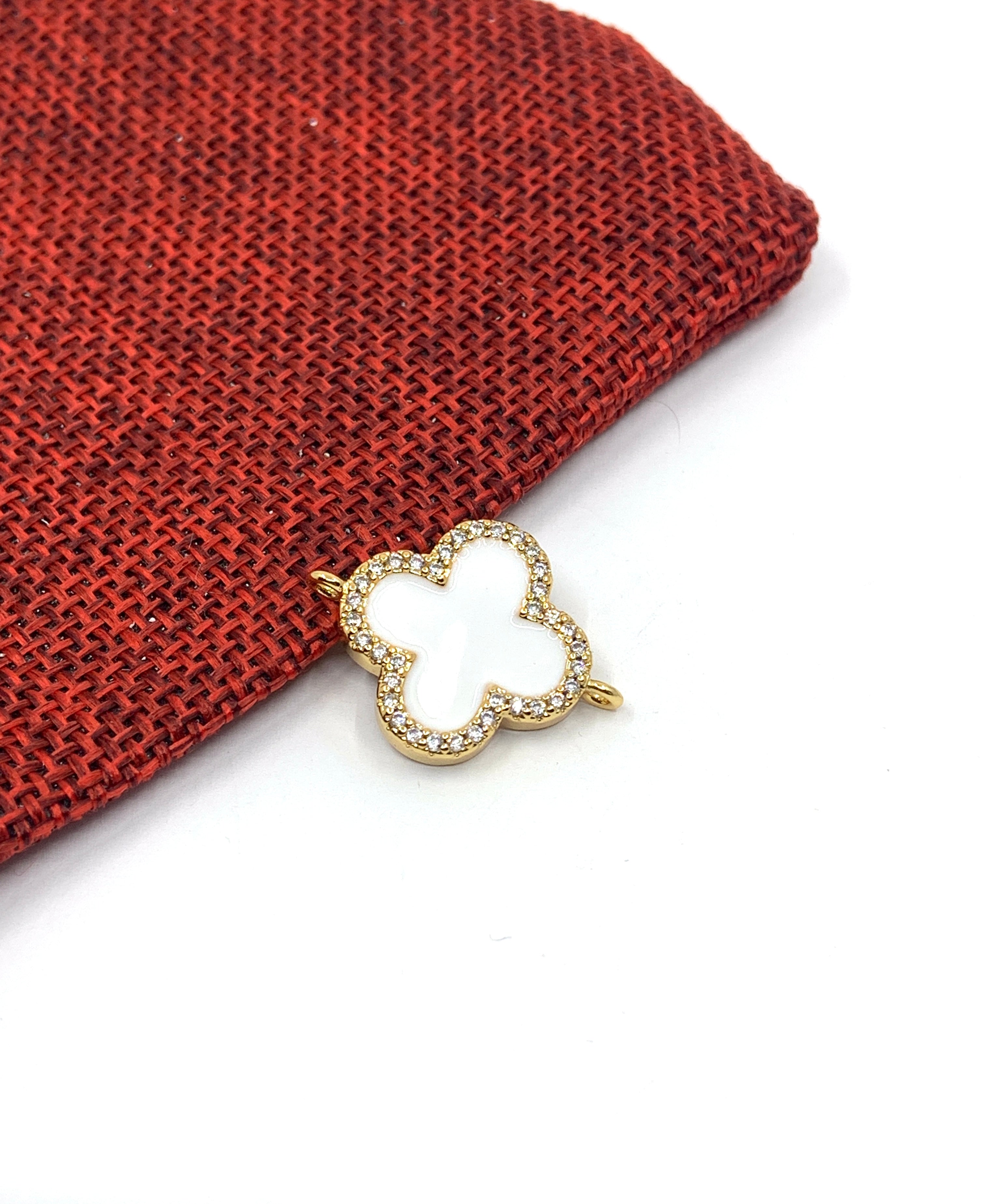 White enamel clover charm with 2 loops