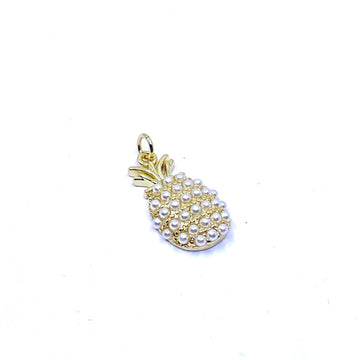 A gold pineapple-shaped charm embellished with small white faux pearls, shown on a plain white background.