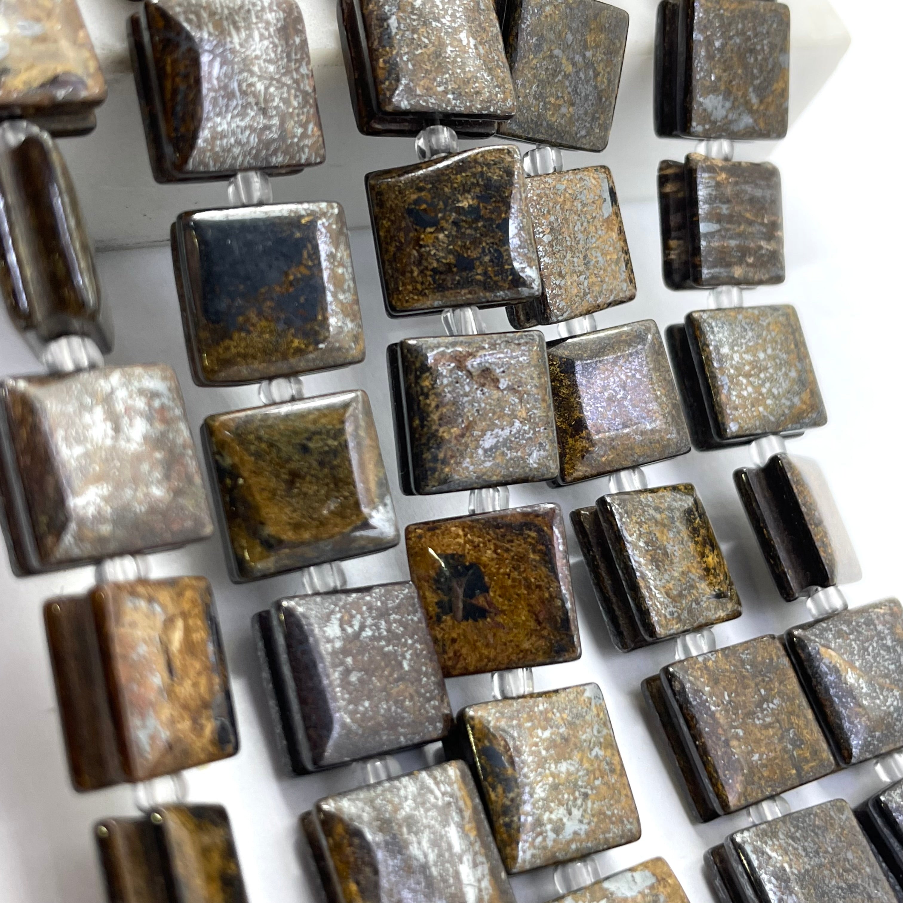 Flat square bronzite beads