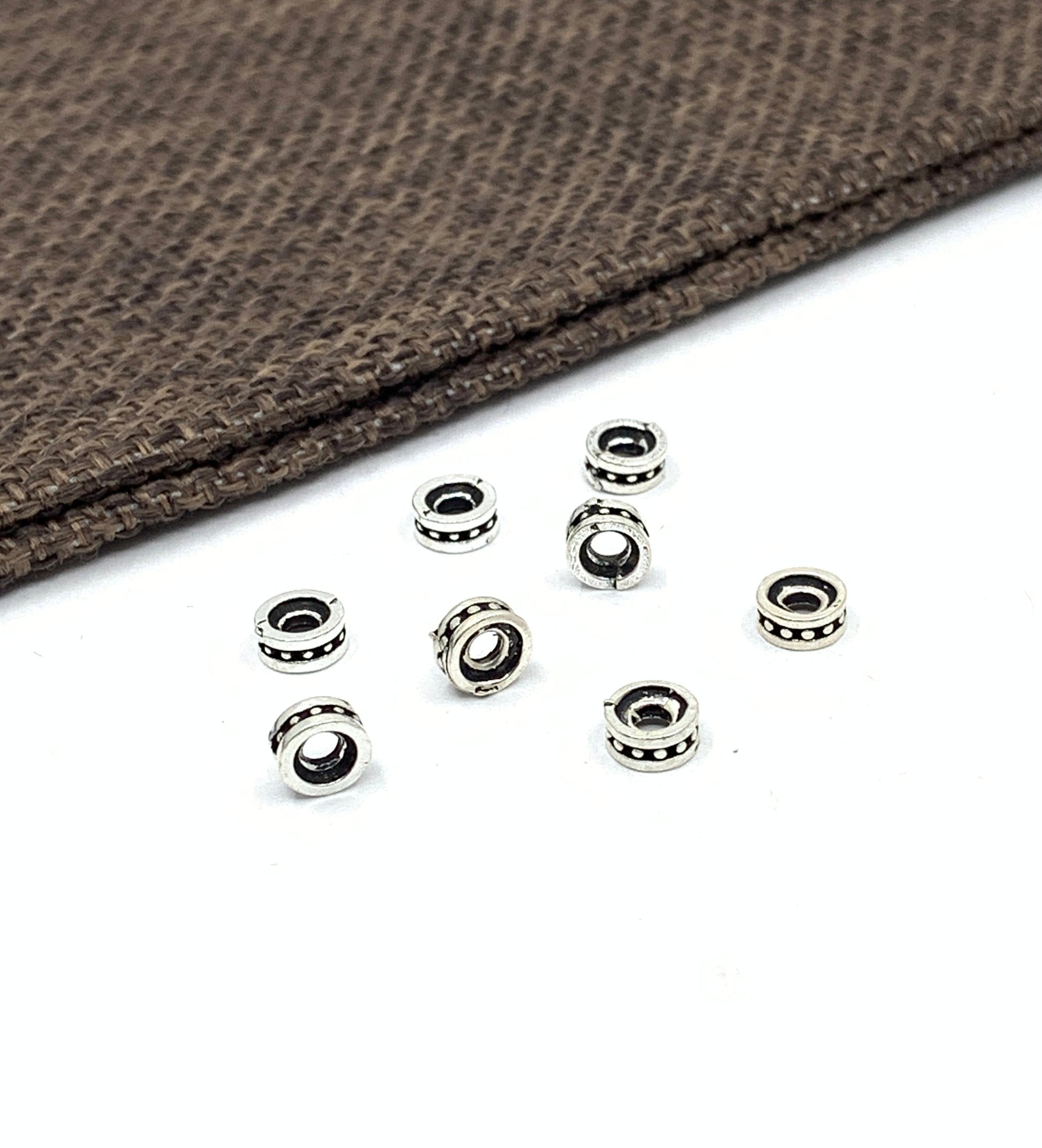 Flat round bracelet spacers