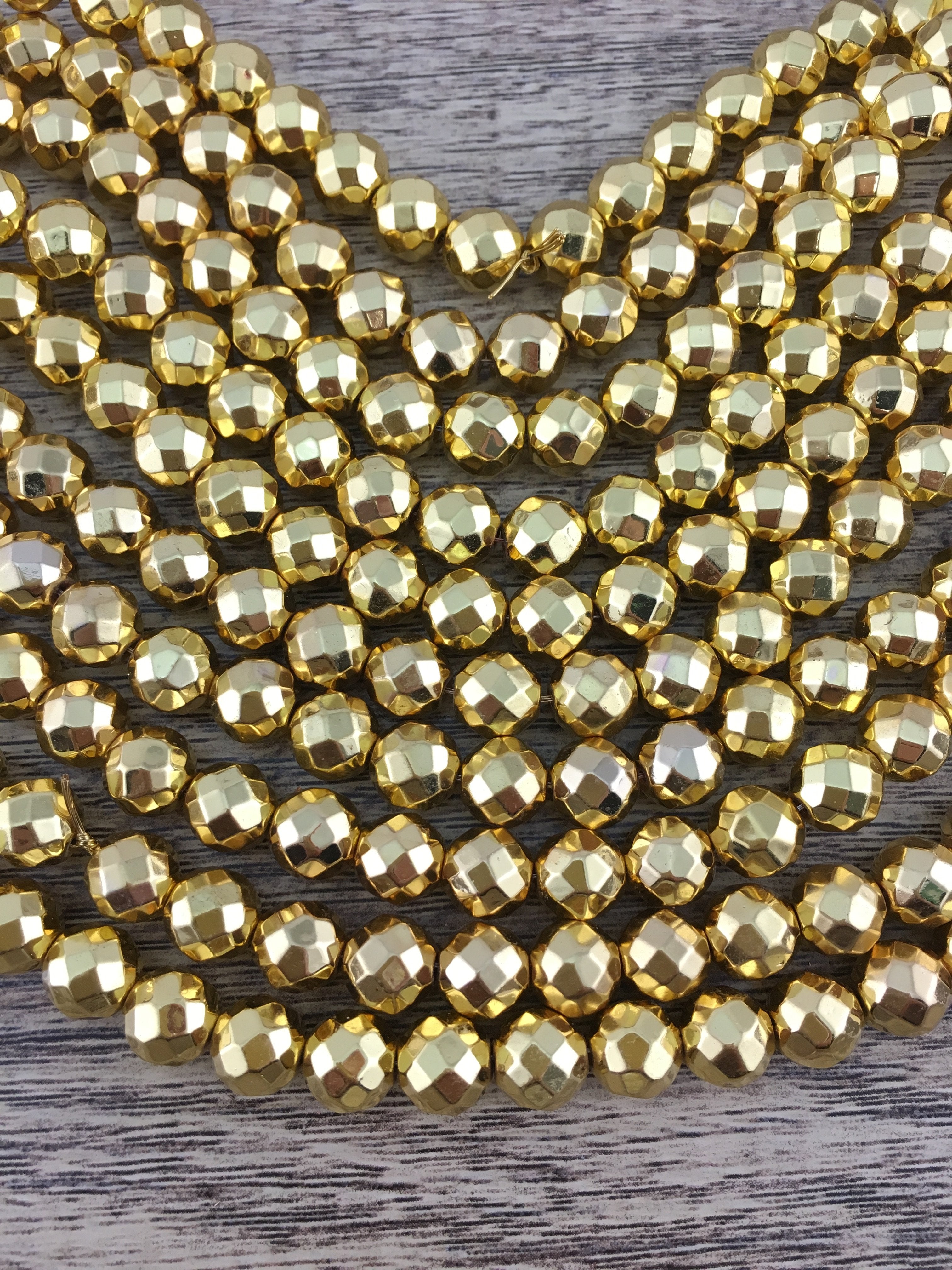 10mm Gold Faceted Hematite Bead | Bellaire Wholesale