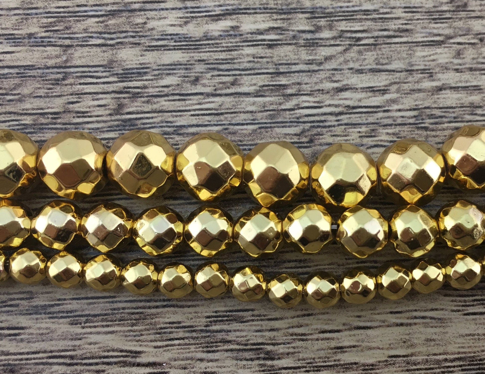 10mm Gold Faceted Hematite Bead | Bellaire Wholesale