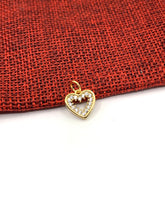 Gold heart charm pendant