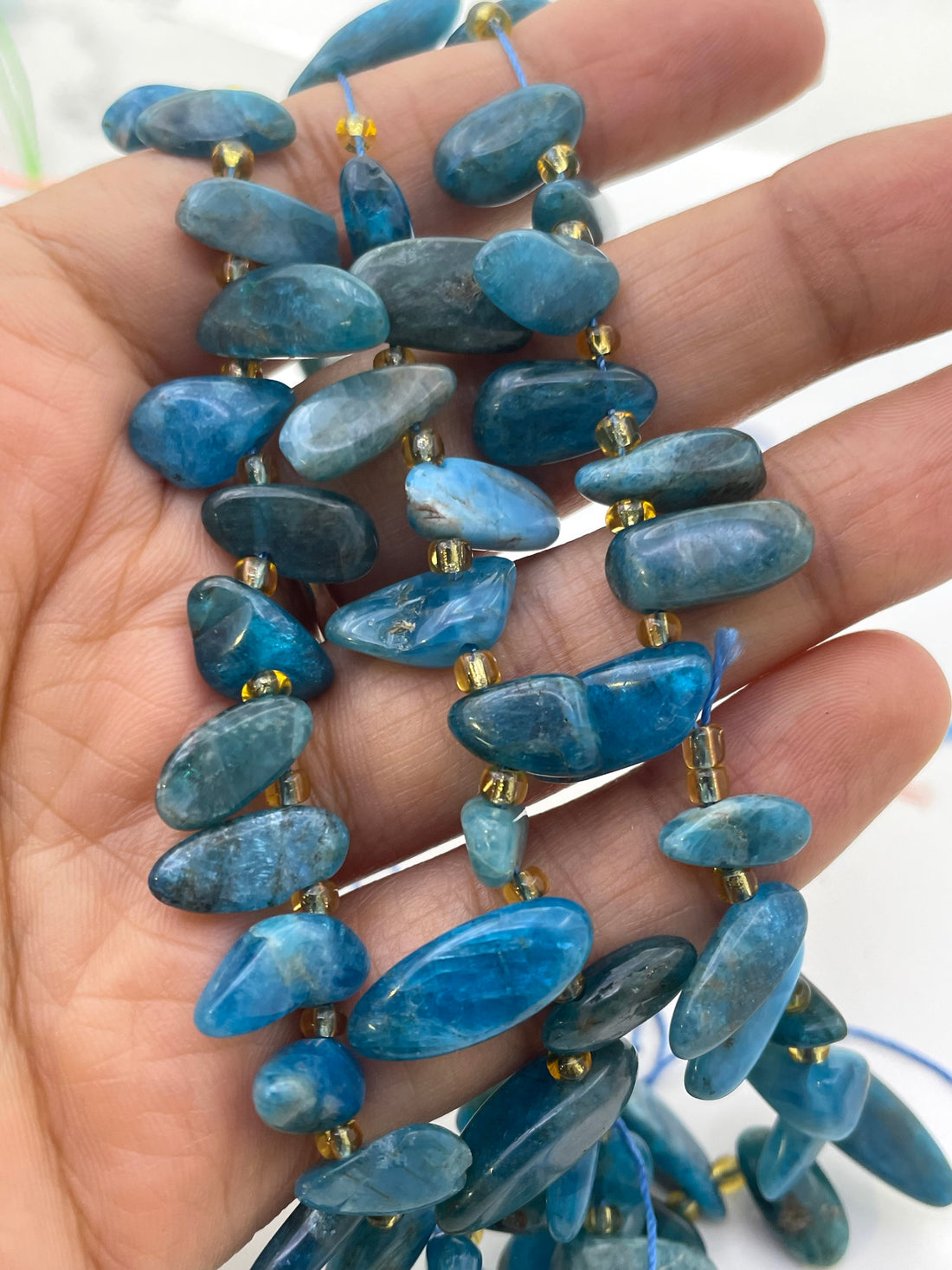 Raw Tooth Gemstone Beads against white background