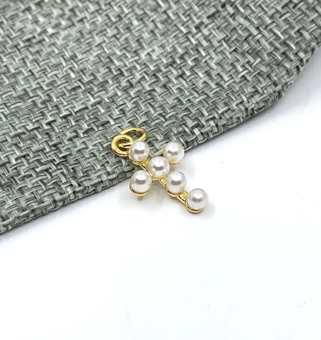 Pearl cross charm pendant