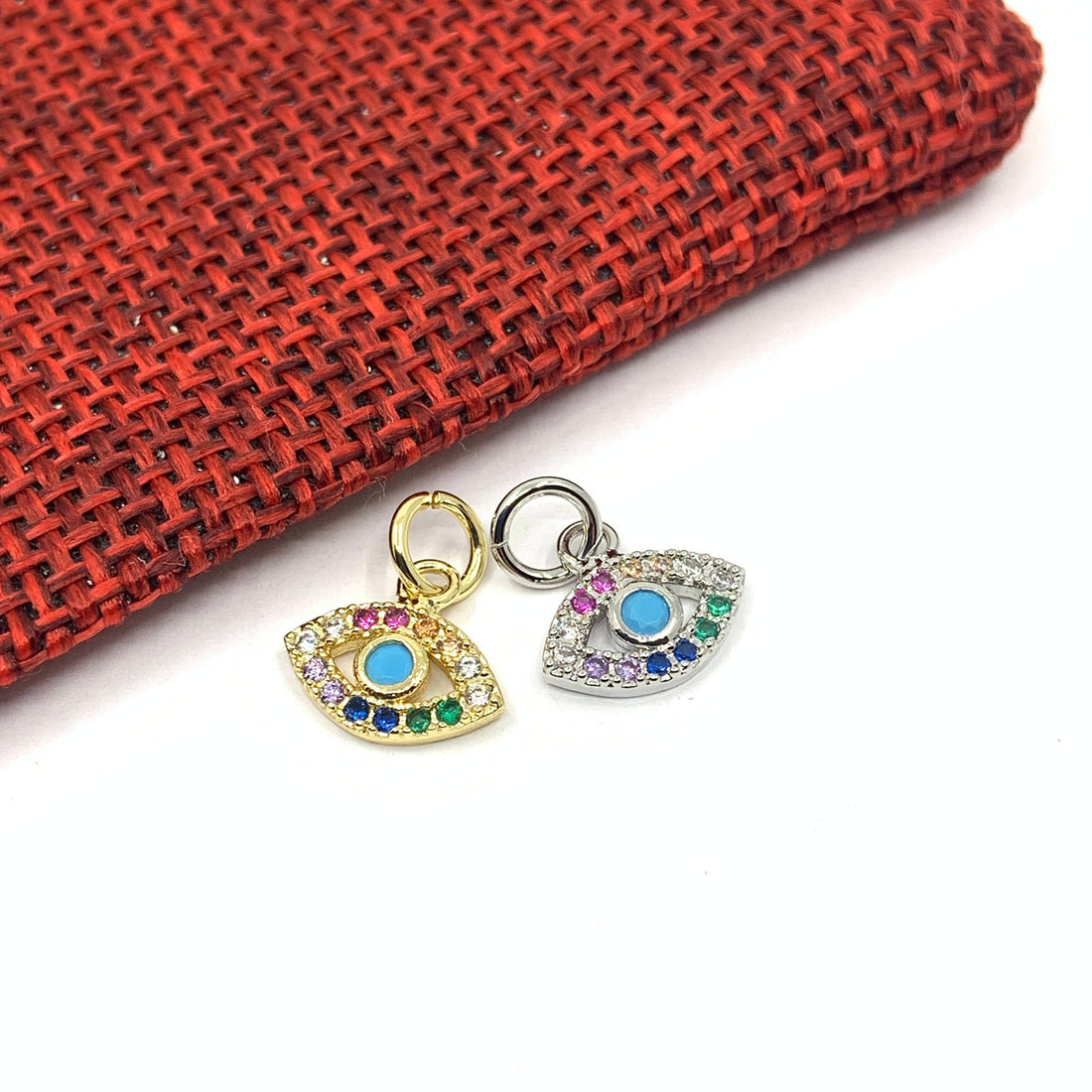 Pave evil eye pendant with multi colored stones