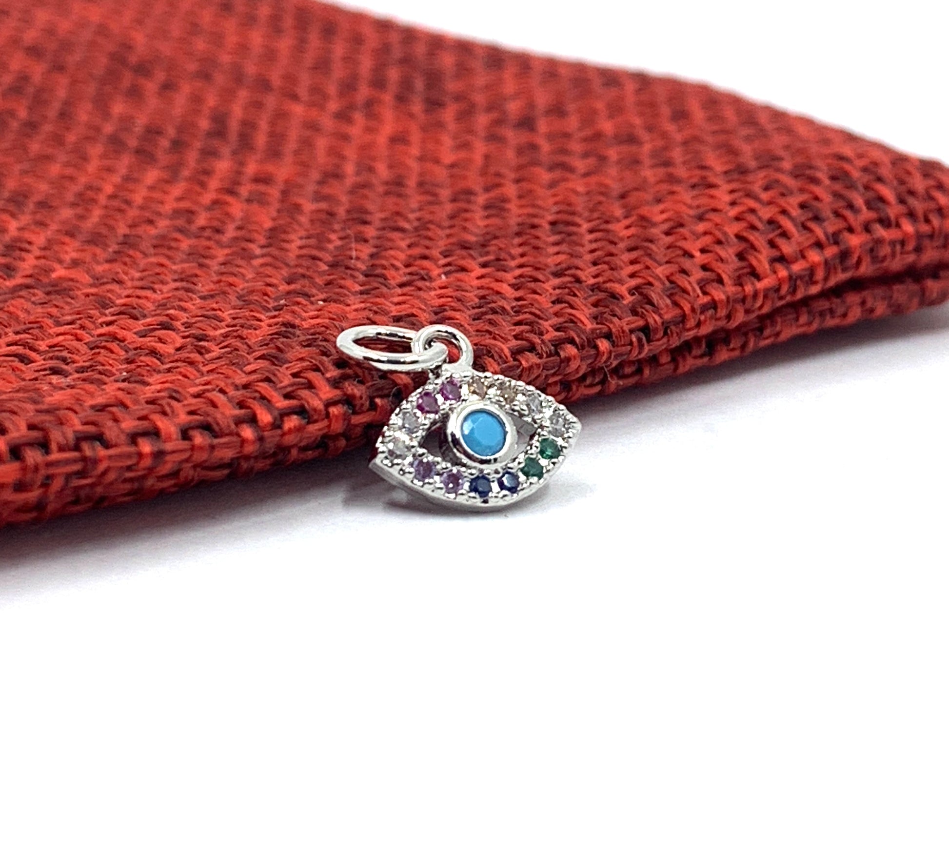 Rhodium plated evil eye charm pendant