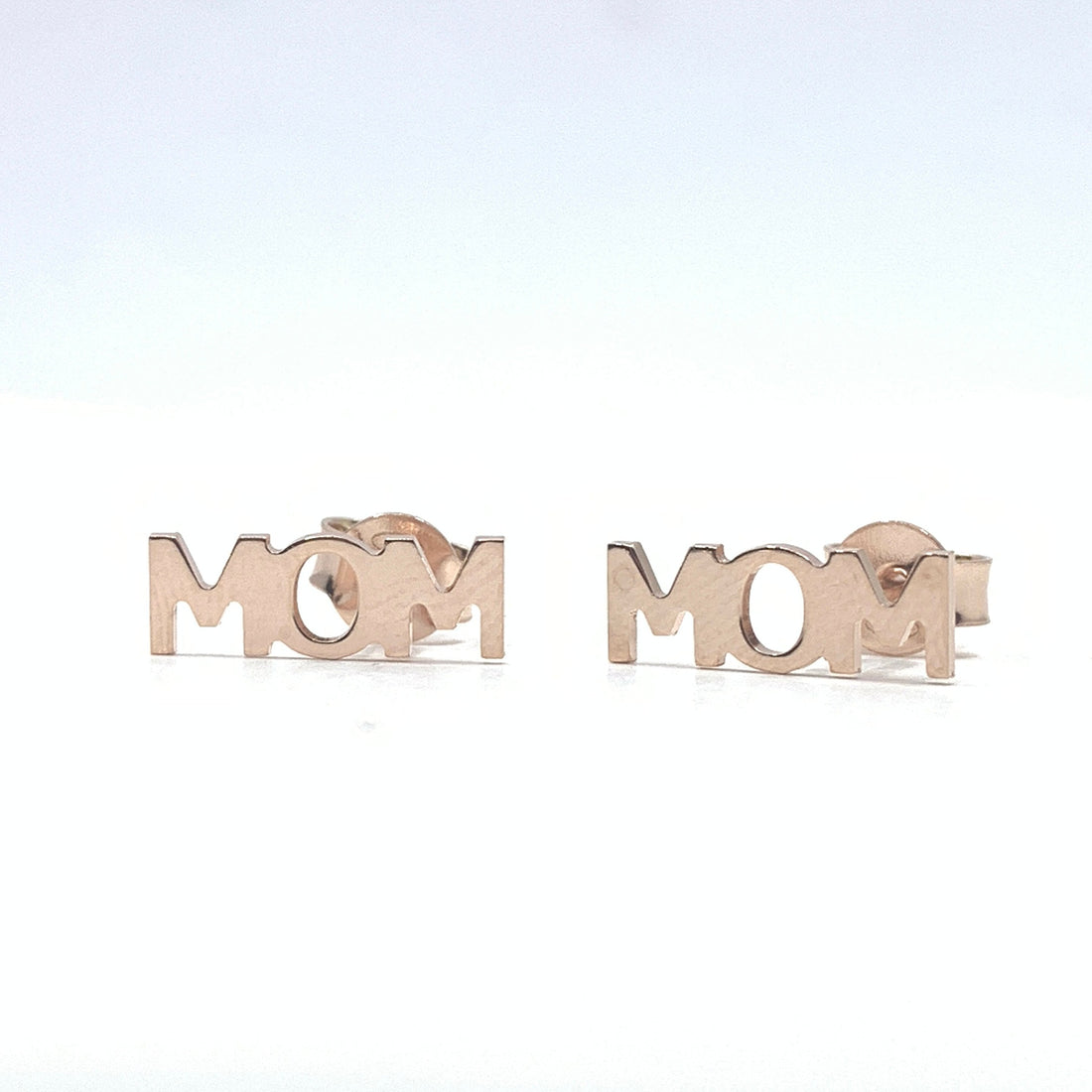 Mom writing stud earrings in rose gold color