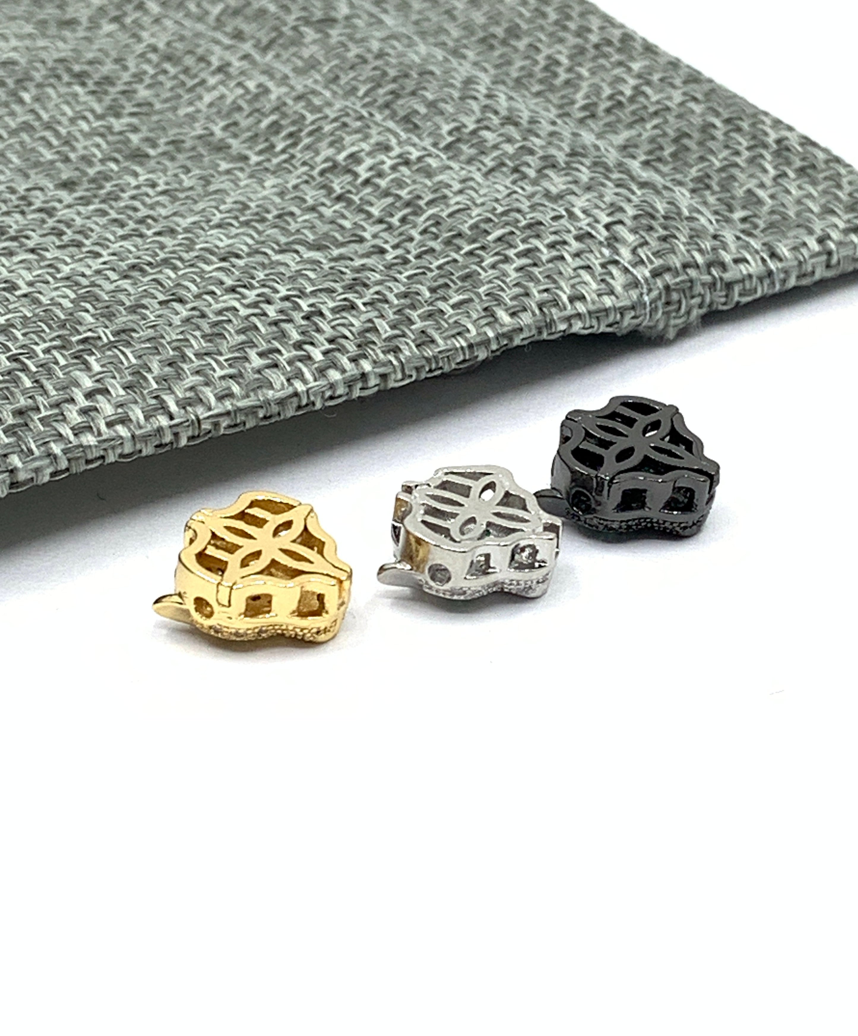 Gold, silver and gunmetal panther beads
