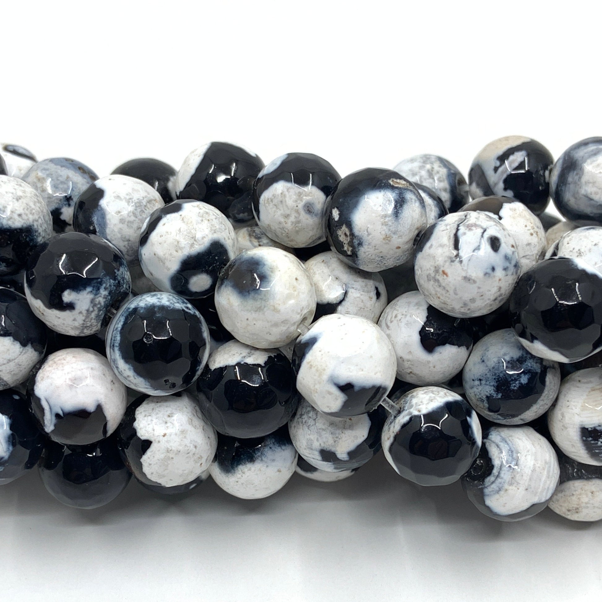 Faceted Black Fire agate rolled together