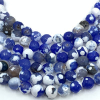 Faceted round Blue Fire Agate lined up side by side and curved 