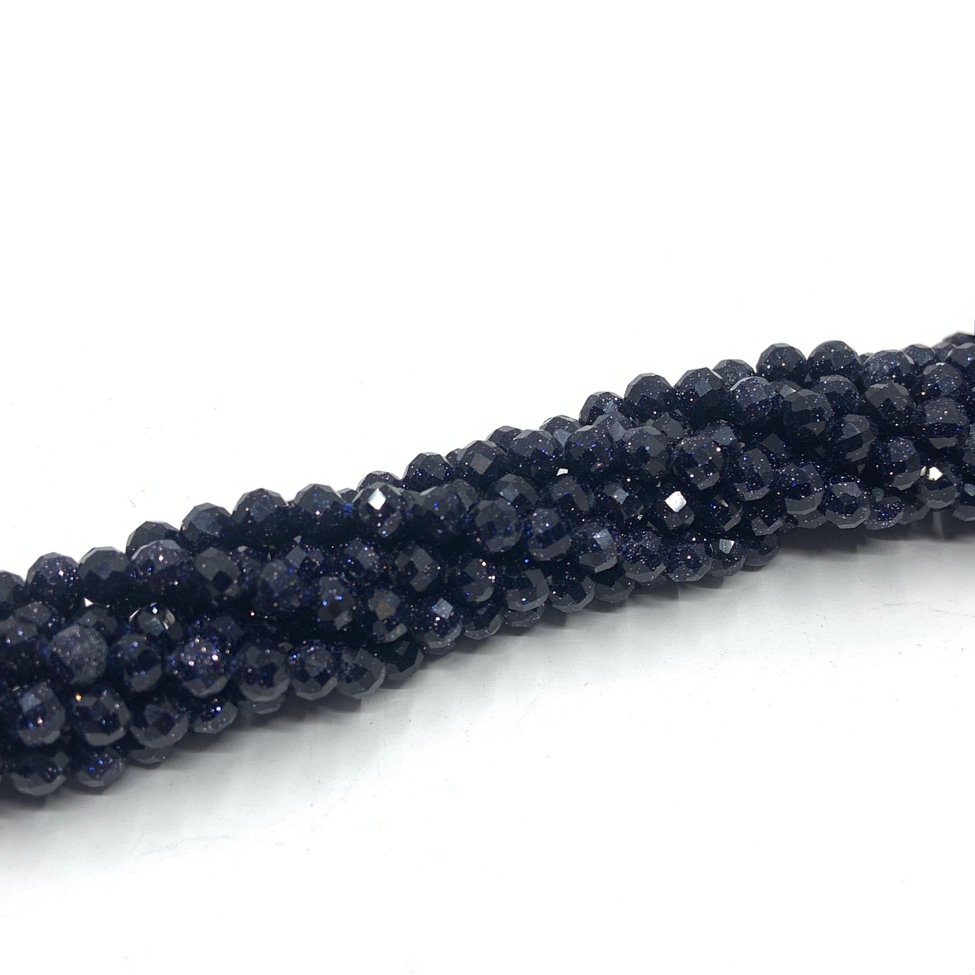 Round faceted blue sandstone beads