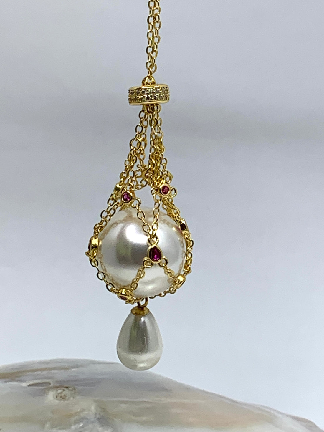 Silver pearl cage necklace