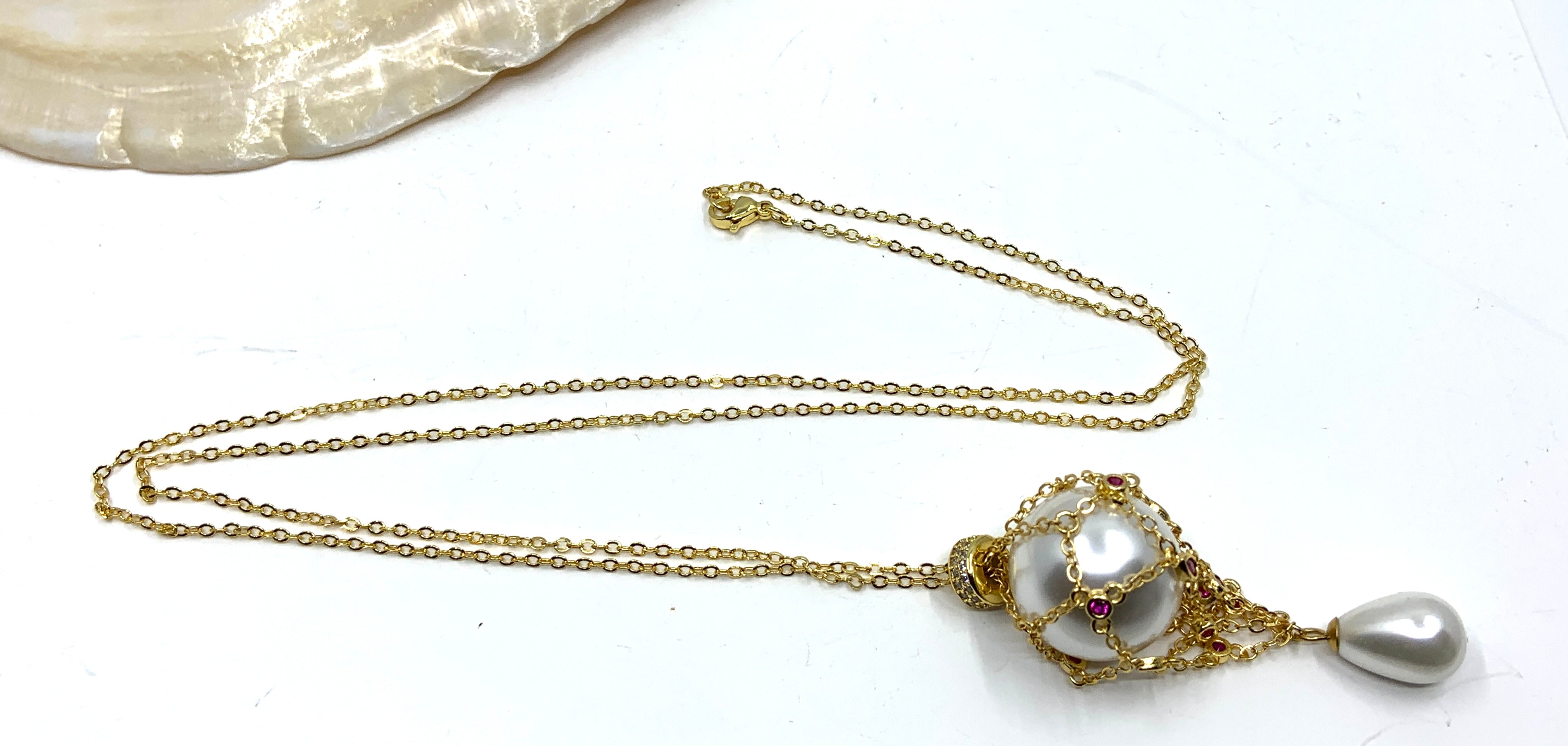 Gold pearl cage necklace