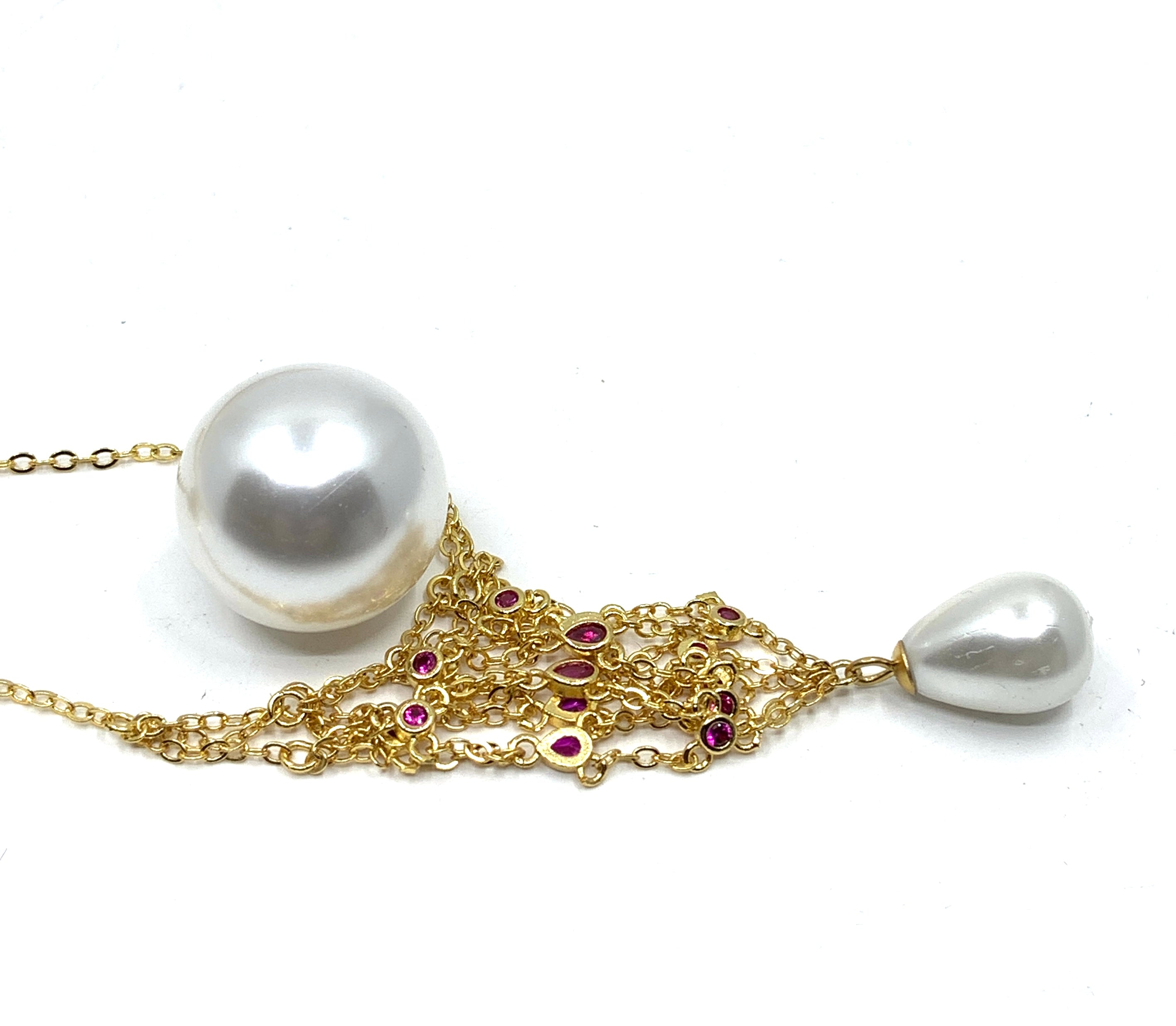 Gold pearl cage necklace