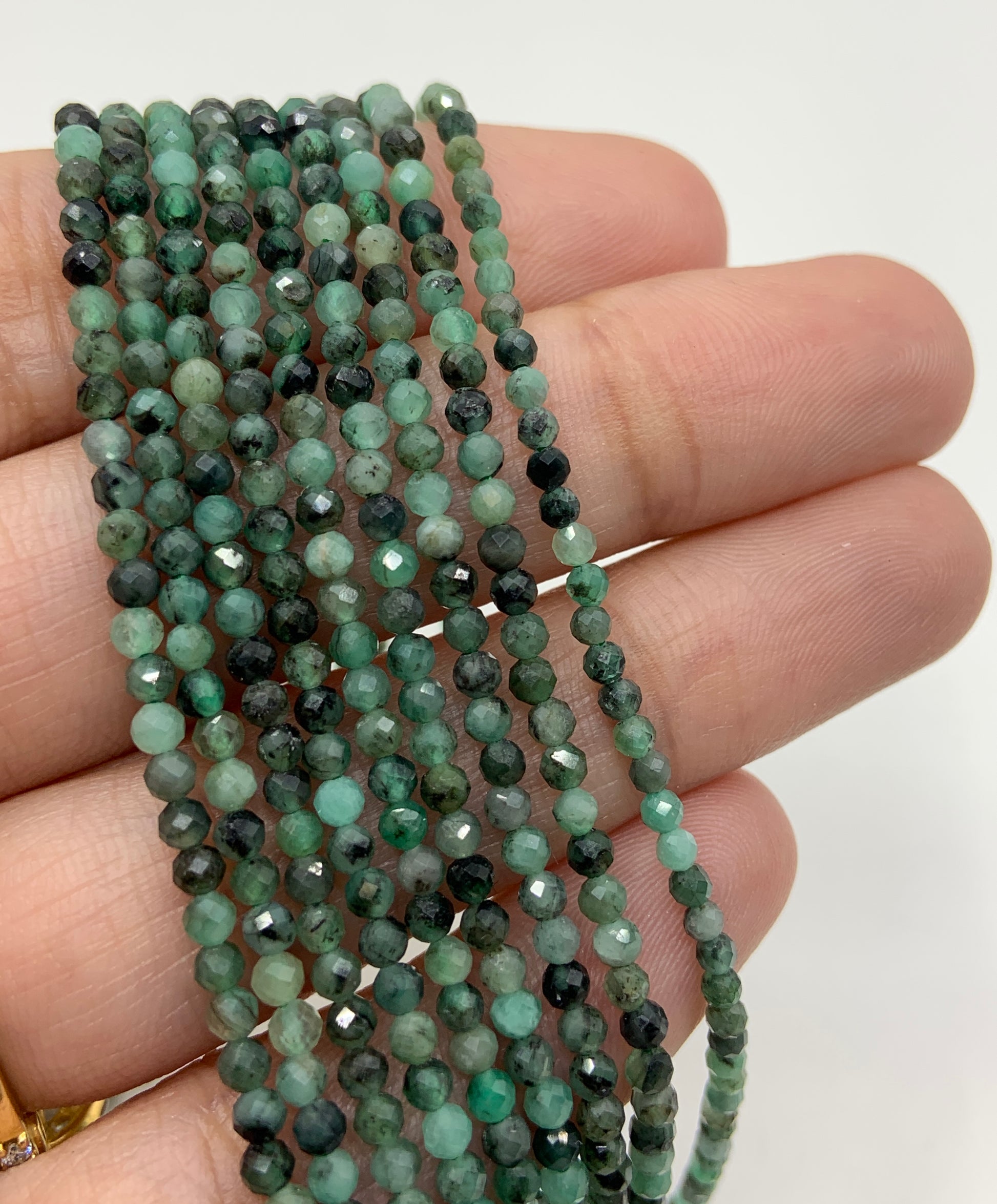 2mm Micro Faceted Emerald