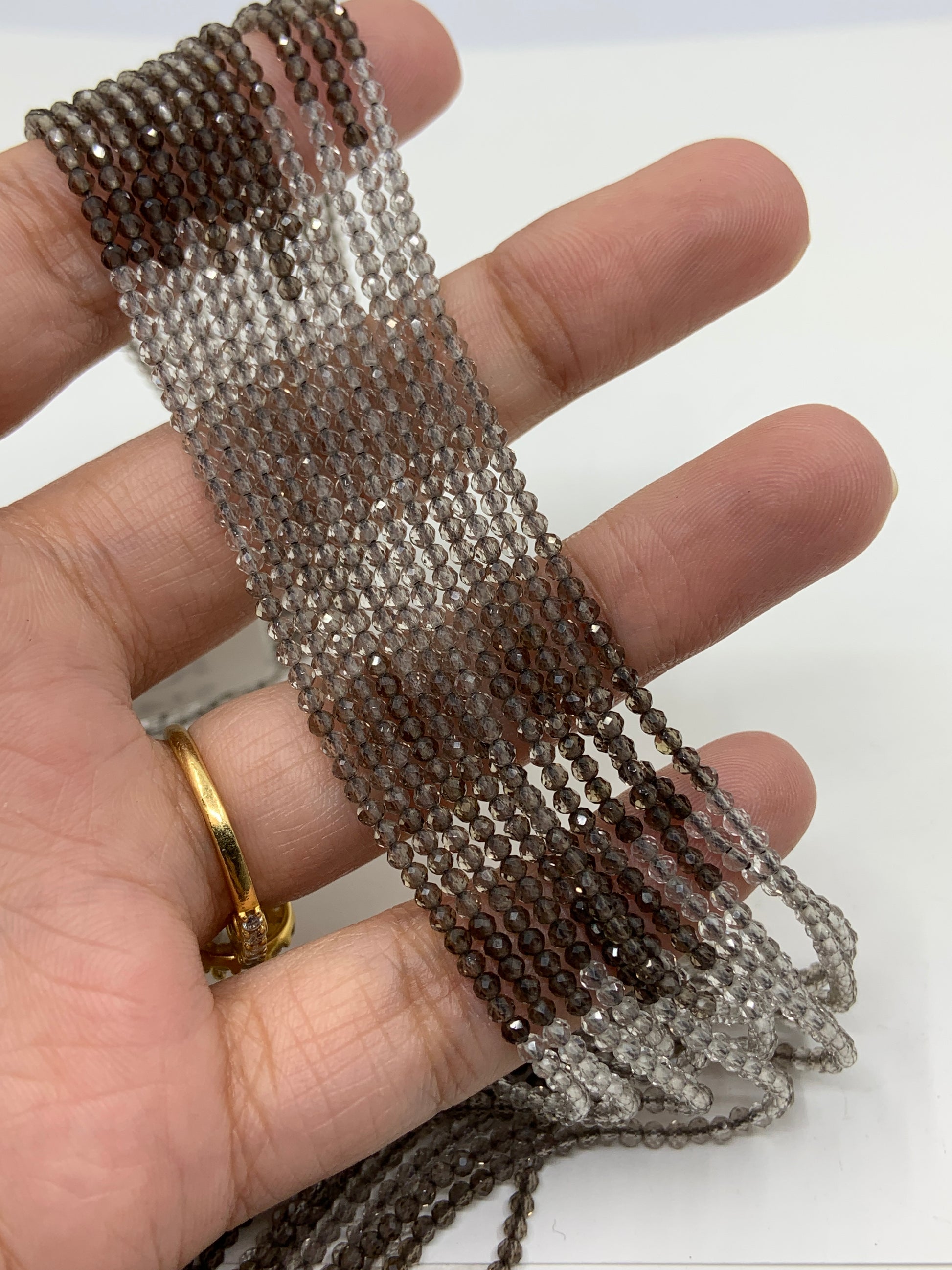 2mm Micro Faceted Rainbow Smoky Quartz