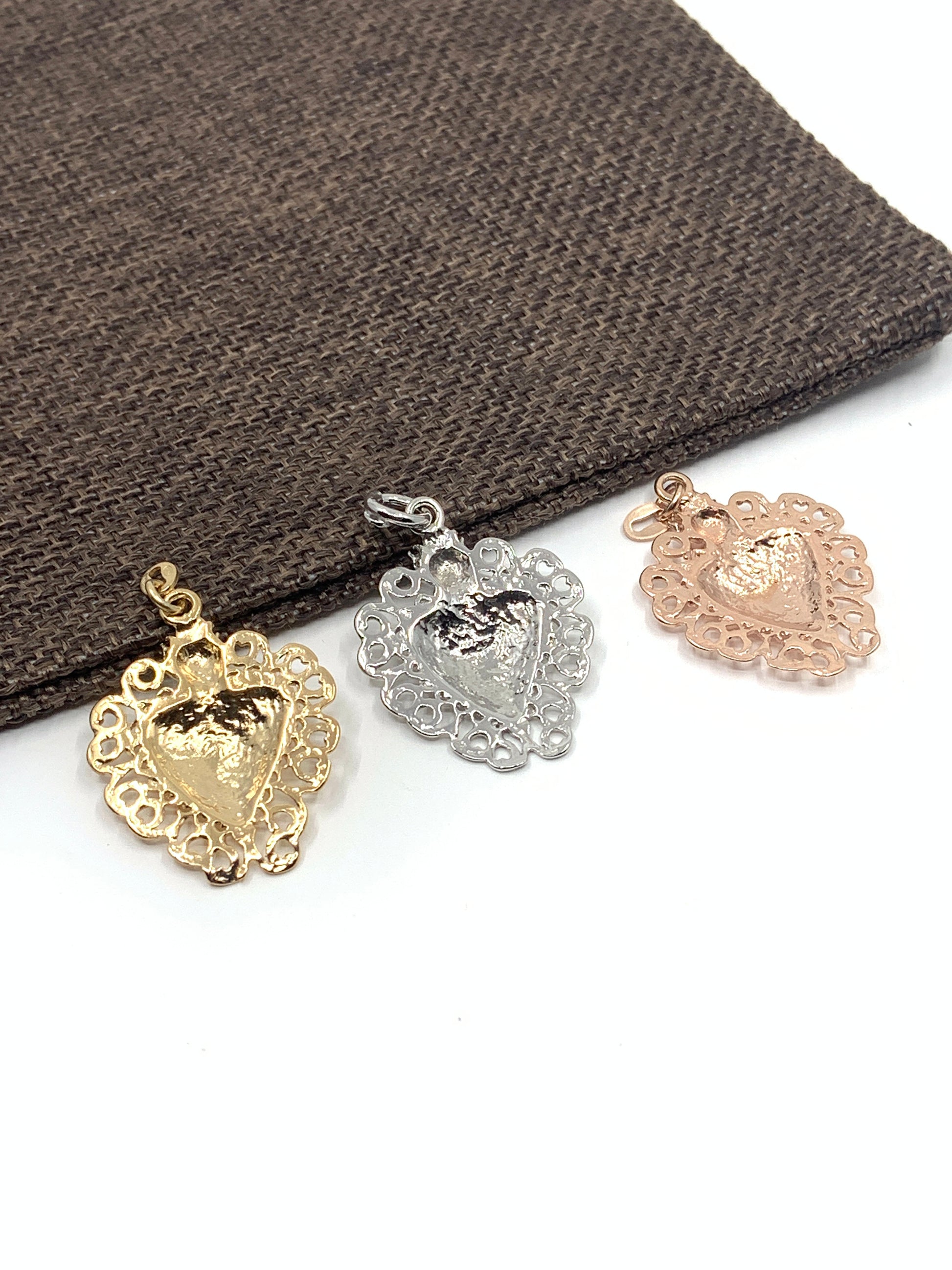 Back side of ex-voto heart pendants 