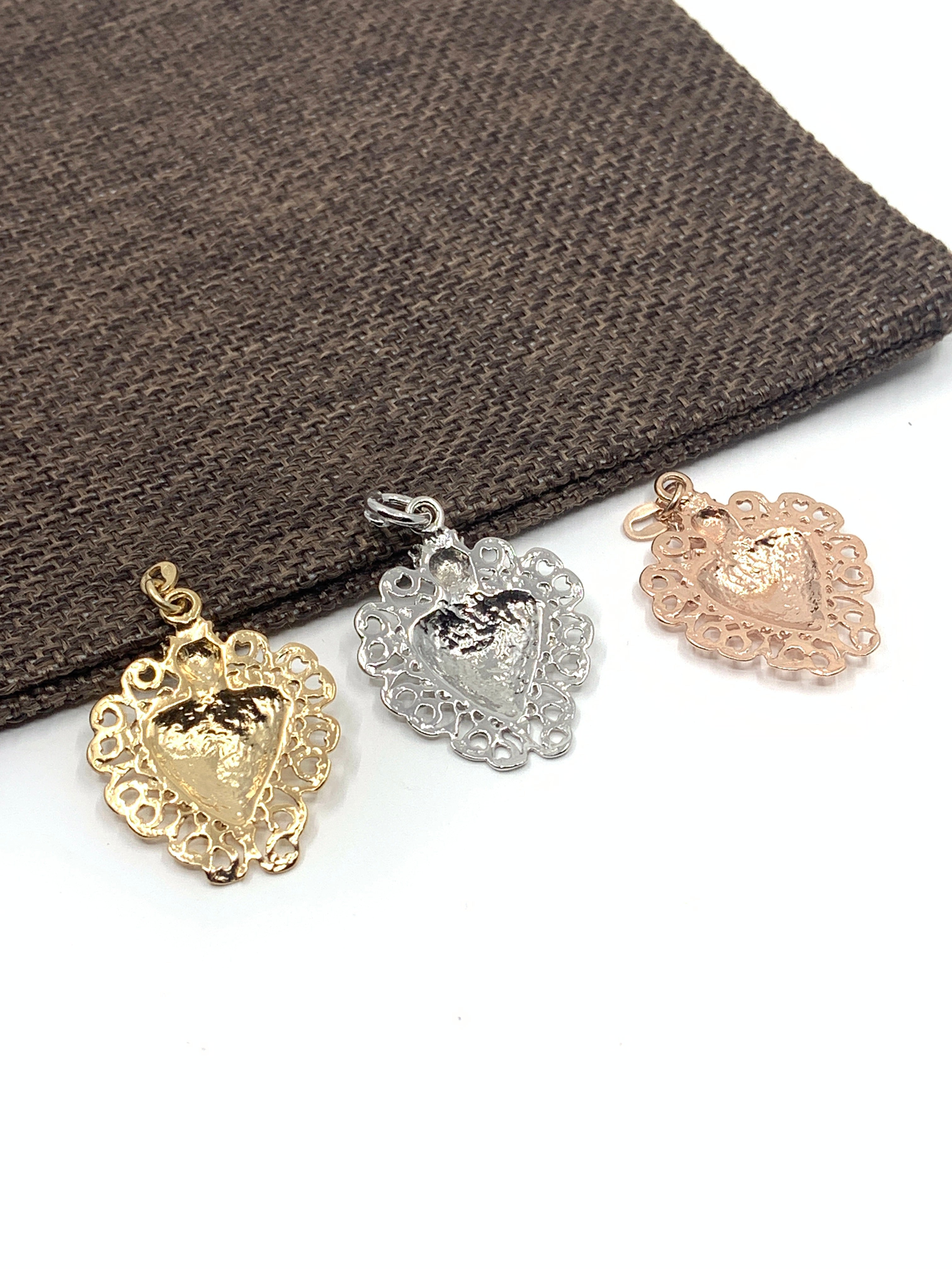 Back side of ex-voto heart pendants 