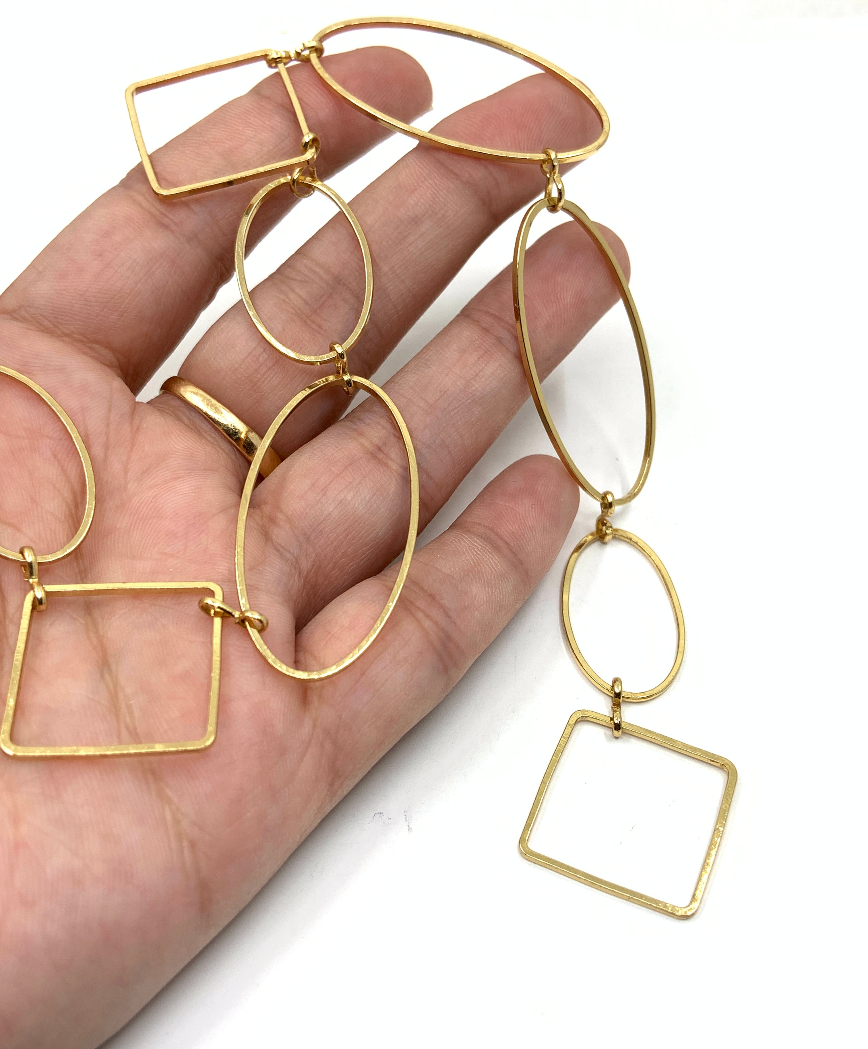 Large link chains on hand for size reference