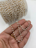 Unfinished pearl chain on hand for size reference