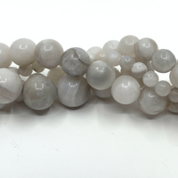 Twisted strands of white lace agate beads