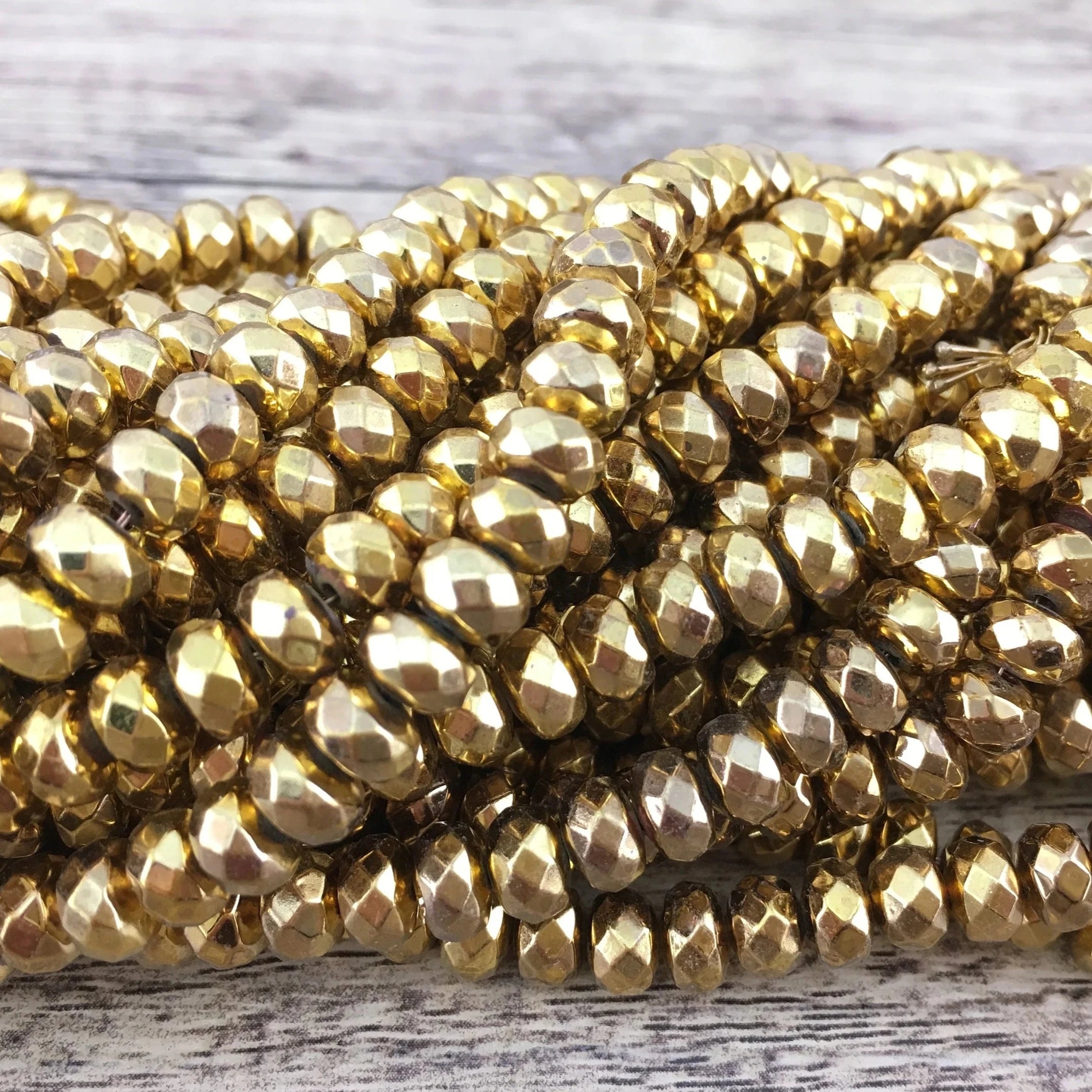Donut Gold Faceted Hematite Bead | Bellaire Wholesale