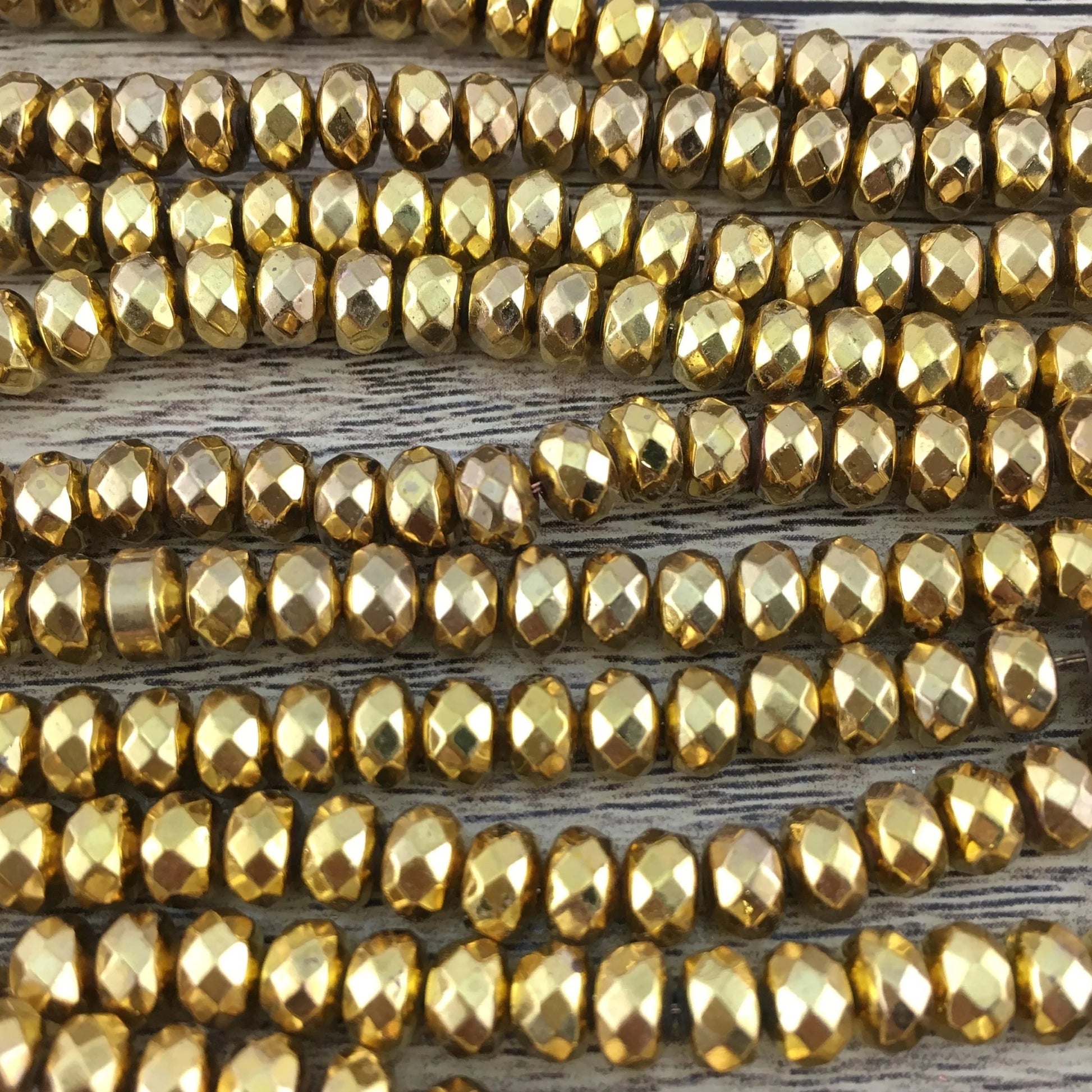 Donut Gold Faceted Hematite Bead | Bellaire Wholesale