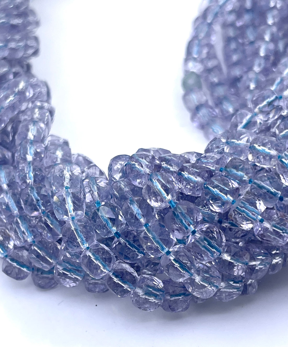 Blue topaz beads twisted onto each other