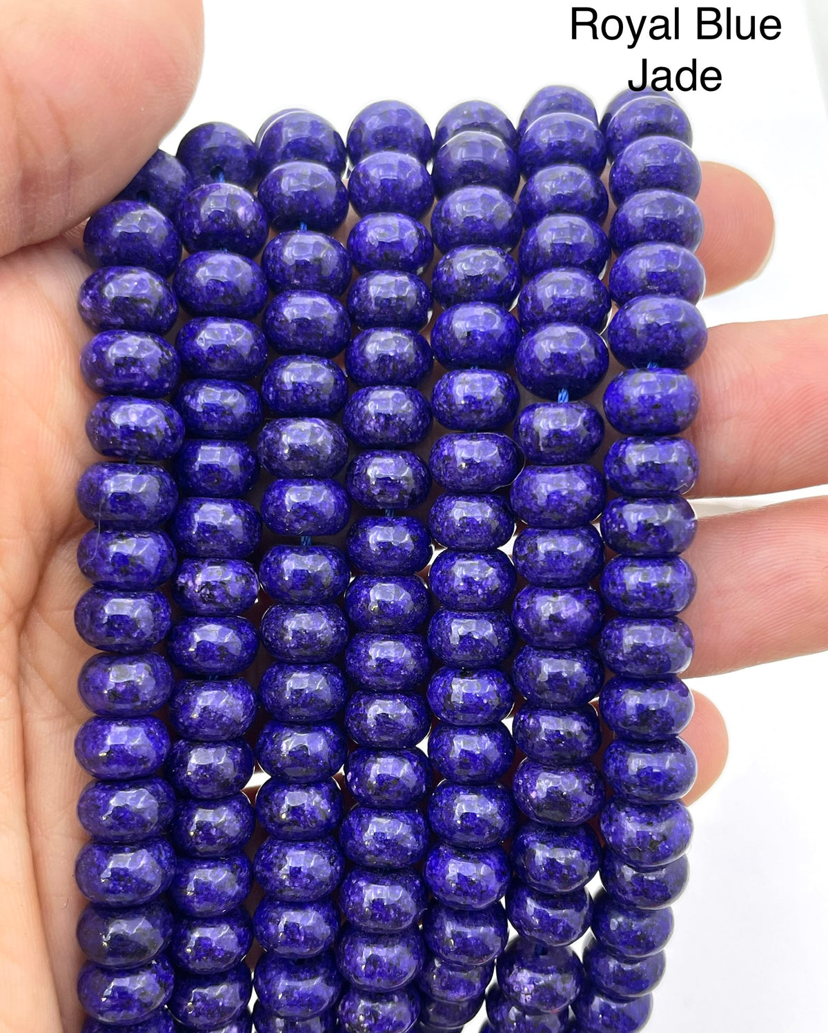 Royal Blue jade on hand for size reference