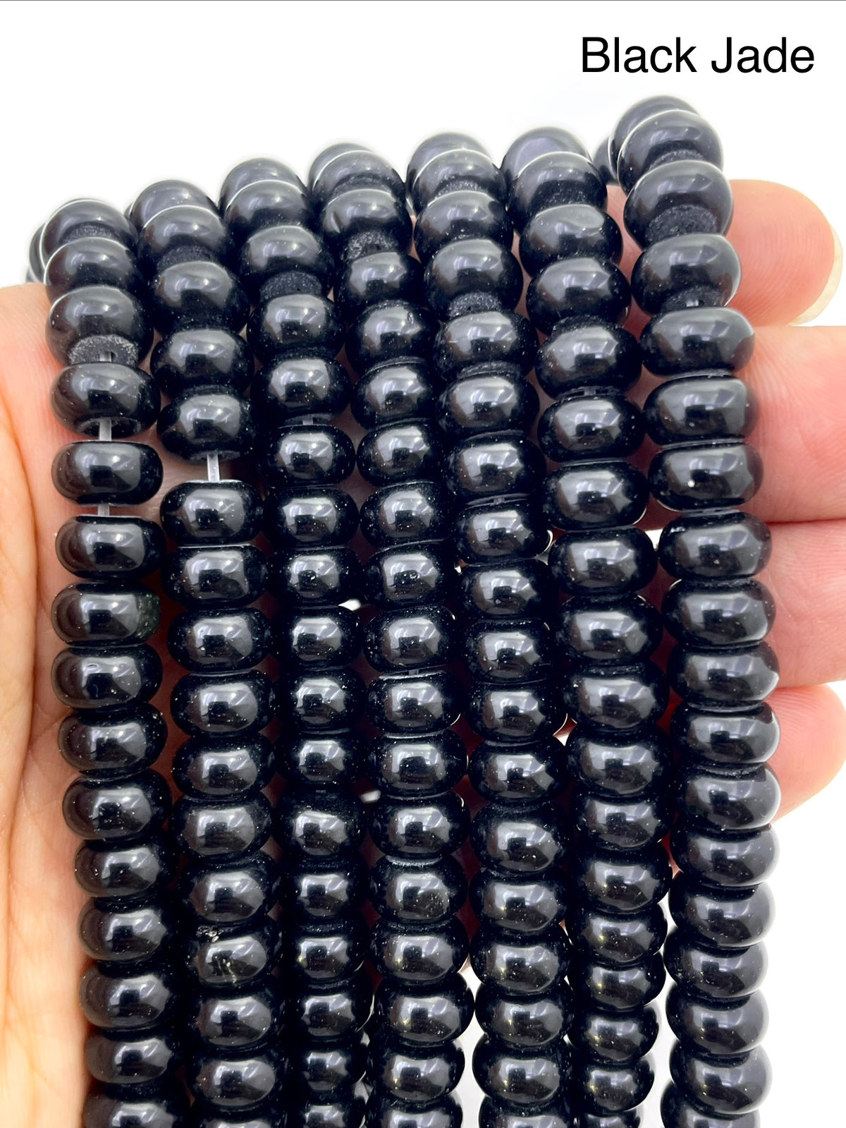 Black jade on hand for size reference