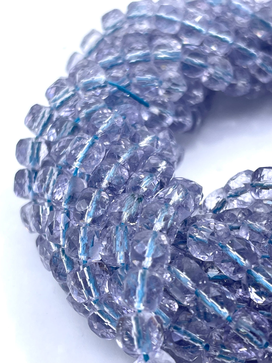 Blue topaz beads twisted onto each other
