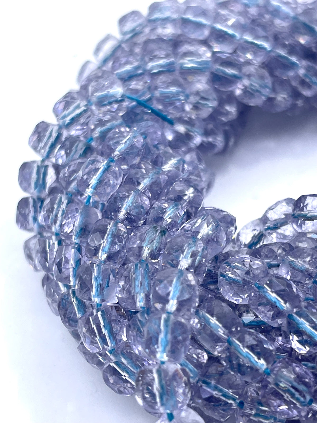 Blue topaz beads twisted onto each other